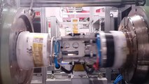 Enjeksiyon Robotu - IML Kova Sarmal etiket uygulaması