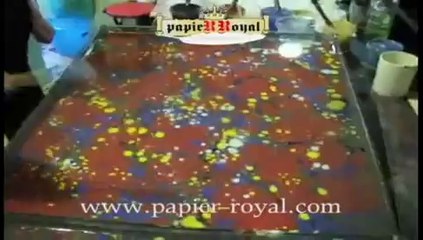 Marbled paper processing. Carta marmorizzata, marmorpapier, papier marbrè, papel marmolado