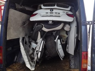BMW X6 Squeezed Inside a Volkswagen Van !