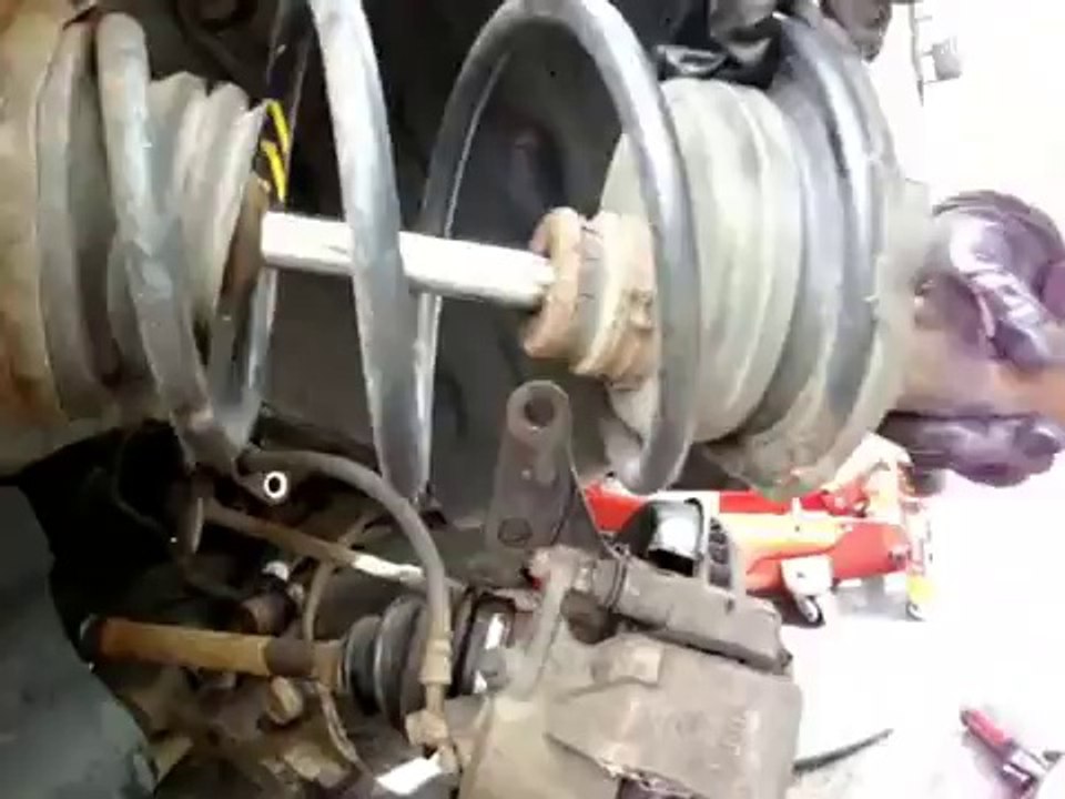 Como Cambiar Amortiguador delanteros Toyota Camry 1988 1989 1990 1991 1993 Manual De Reparacion Mecanica 1 parte