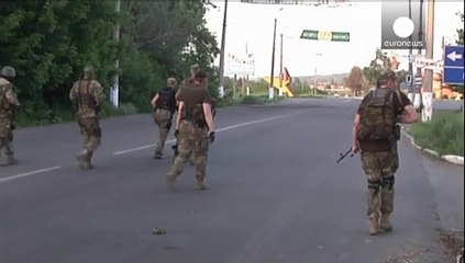 Fighting rages in East Ukraine as talks continue