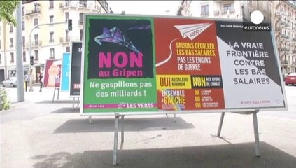 Swiss voters reject minimum wage and purchase of new warplanes