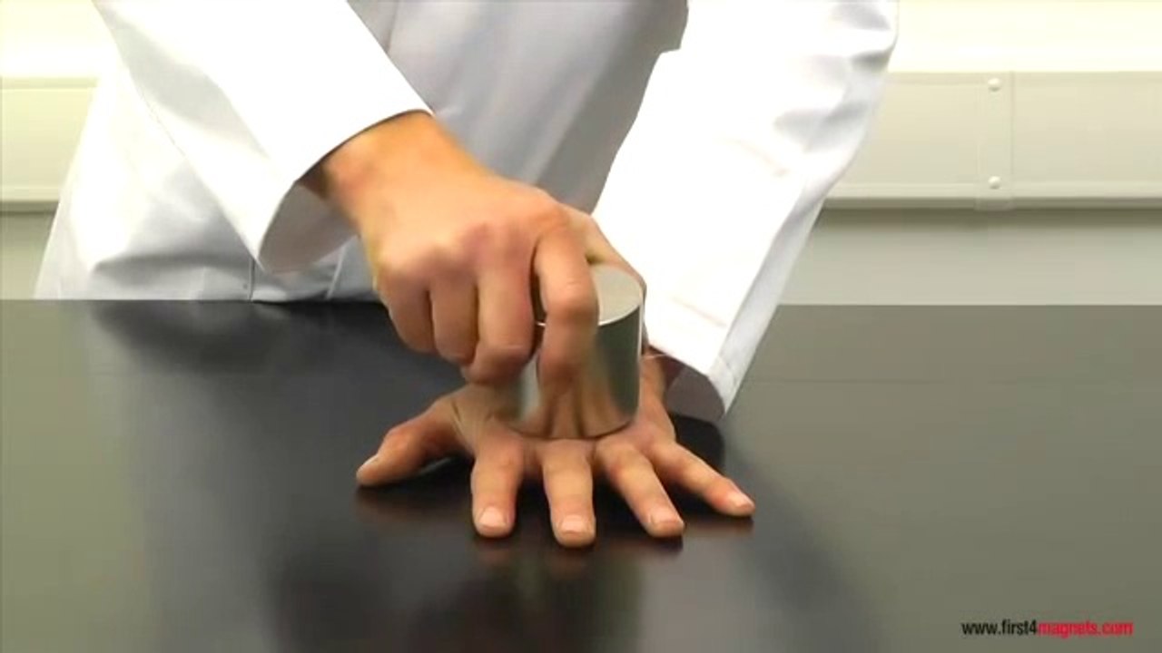 Super-strong neodymium magnets crushing a man's hand!