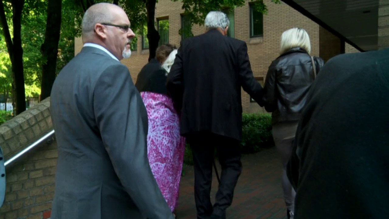 Rolf Harris arrives at court for sex assault trial