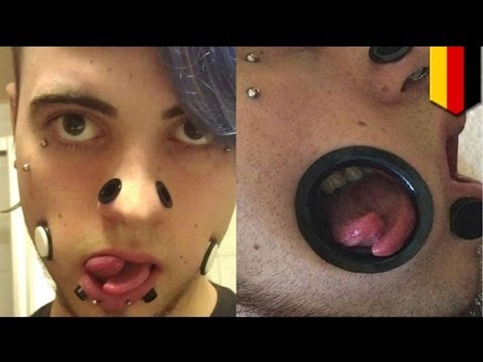 German man takes body art to the next level with cheek holes, forked tongue