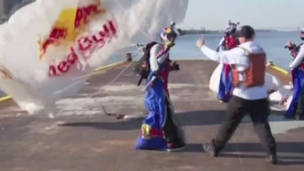 Wingsuit athletes fly over Manhattan skyline