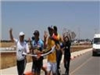 العداء الأسترالي باتريك فارمر يحمل رسالة السلام للشرق الأوسط