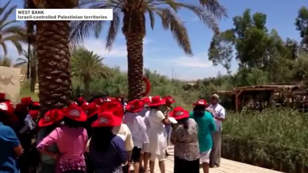 Pilgrims visit river where Jesus was baptized