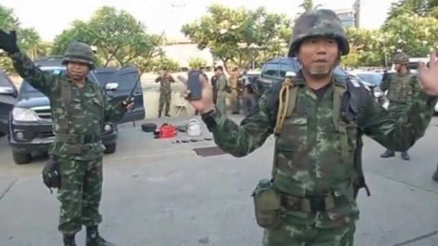 Thai soldiers confiscate weapons after army declares coup