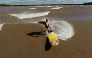 Robby Naish surfing a tidal wave - SUP