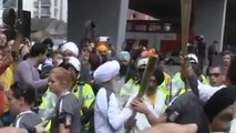 Fauja Singh Running with the Olympics Torch in London