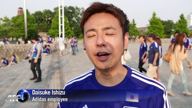 Japanese football squad get rock star send-off for World Cup