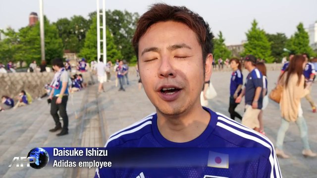 Japanese football squad get rock star send-off for World Cup