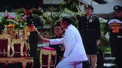 Thai junta chief gets royal nod, threatens protesters