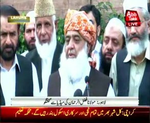 Fazal ur Rehman addressing a press conference
