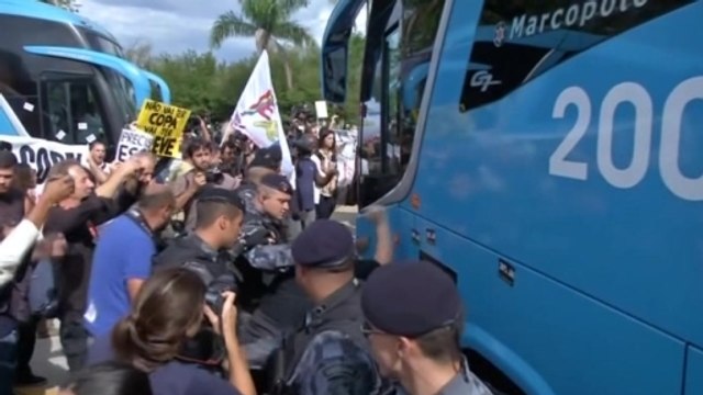 Brazilian team is swarmed by anti-World Cup demonstrators