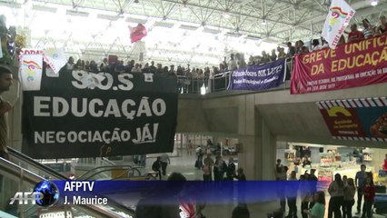 Protests as Brazil stars arrive at World Cup camp