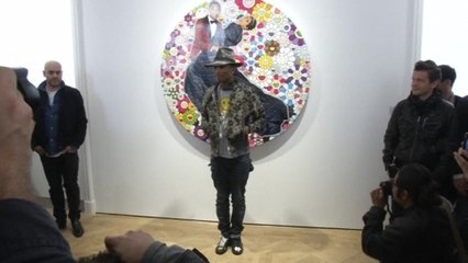 Pharrell Williams celebrates femininity at Paris exhibition