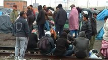 French riot police evacuate Calais immigrant camps