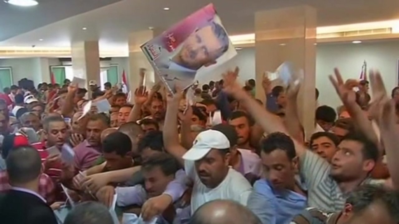 Syrians abroad begin casting votes in presidential election