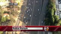 Amazing Police Chase - Suspect tricks police by taking off coat and walking away