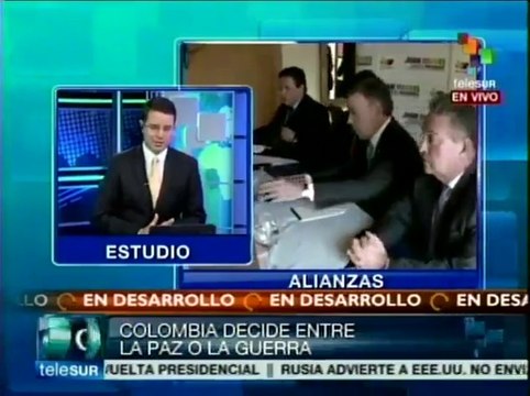 Colombia: candidatos Santos y Zuluaga velan armas y cambian de opinión