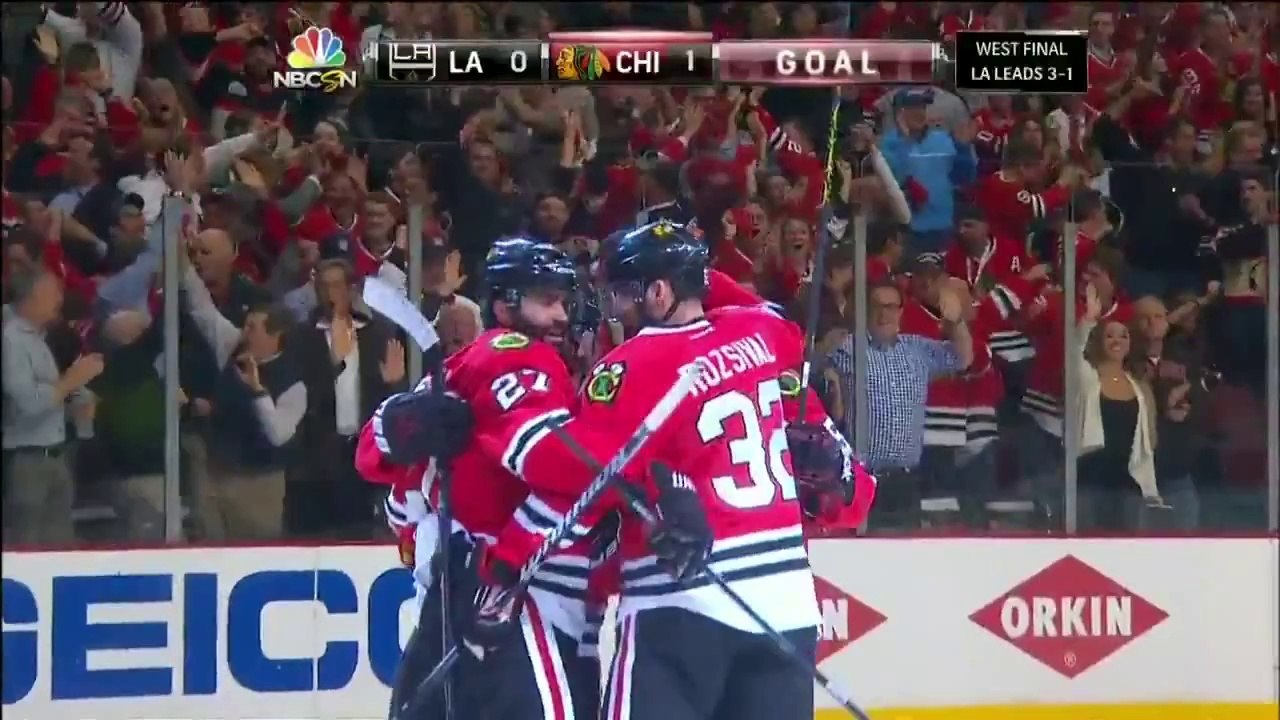 Johnny Oduya rushes up the ice to beat Quick