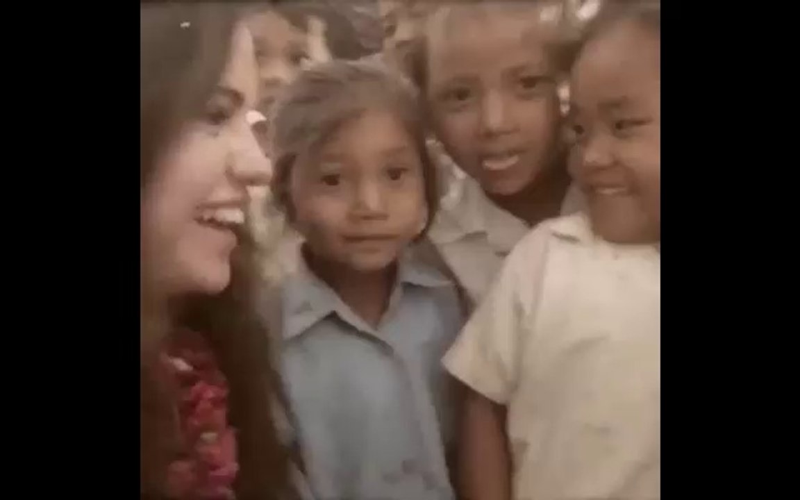 Selena Gomez cute and happy with children of Nepal