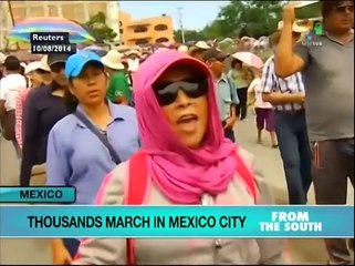 Thousands march in Mexico City demanding justice for missing students