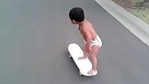Two year old on a skateboard