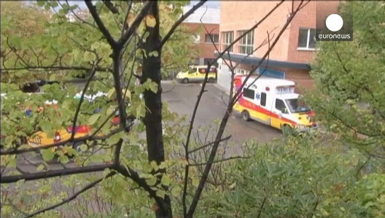 Amid anger, Spanish PM visits hospital where nurse became infected with Ebola