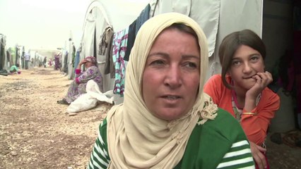 Thousands flee Syrian battleground city