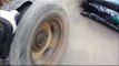 World's Dumbest Man Almost Kills Himself With A Tire