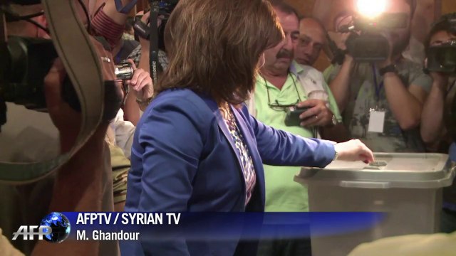 Assad eyes crushing win in controversial Syria polls