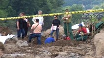 Bosnia floods expose remains of missing war victims