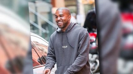 Kanye West lächelt nach seinen Flitterwochen