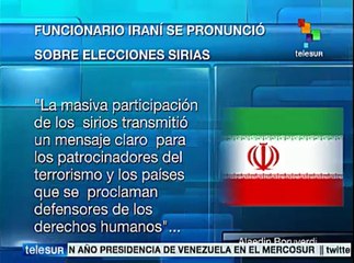 Скачать видео: Funcionario iraní celebra amplia participación en elecciones sirias