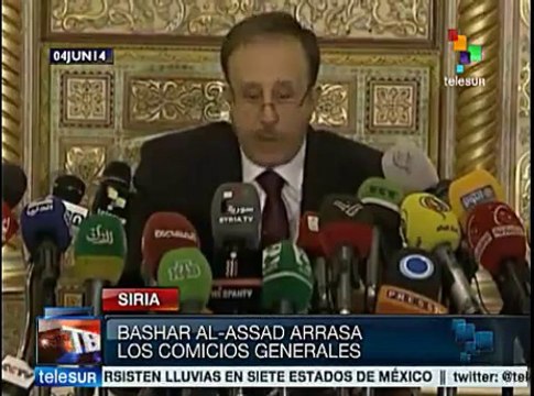 Sirios celebran en las calles triunfo de Bashar Al Assad