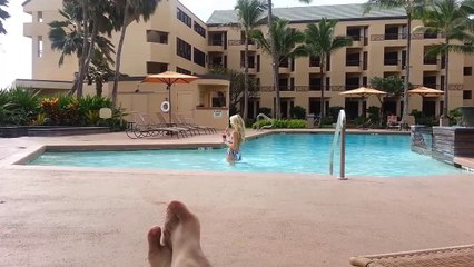 beautiful blonde hair model in swiming pool