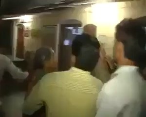 This women beating a police man watch video.