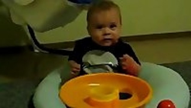 Baby Gets Super Excited over Ball Machine