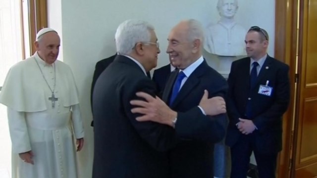 Peres, Abbas embrace ahead of prayers at Vatican