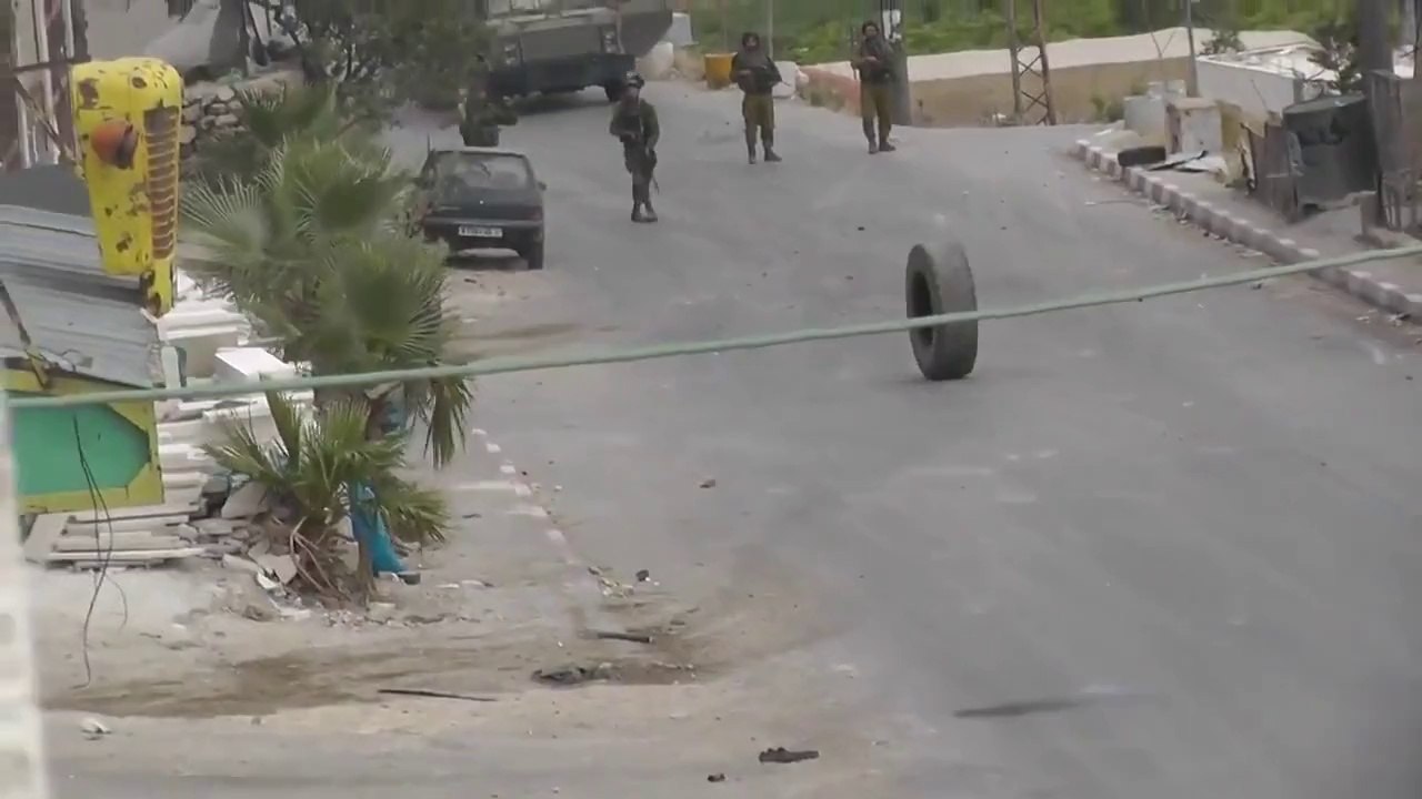So ridiculous soldier FAIL :  Israeli Soldier Knocked Down by Tire