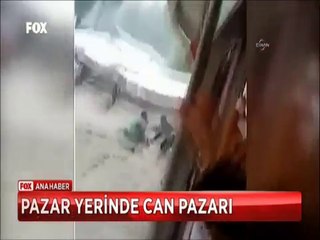 Pazar yerinde sel ile mücadele eden pazarcı son anda böyle kurtarıldı