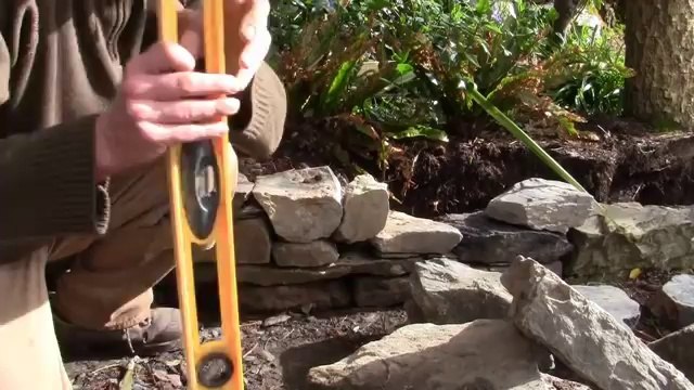 How to make or build a Natural Traditional Irish Dry Stone Wall Making raised Vegetable Beds