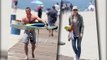 Liev Schreiber and Naomi Watts Take their Children Surfboarding