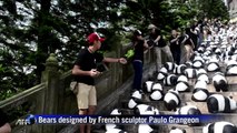 'Flash mob' of paper mache pandas tours Hong Kong