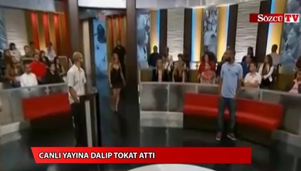 Download Video: Canlı yayına dalıp tokat attı