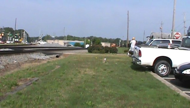 BNSF pwer leads NS 735 Coal Train SB through Austell Ga.
