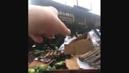 Train Hits Water Melon Truck